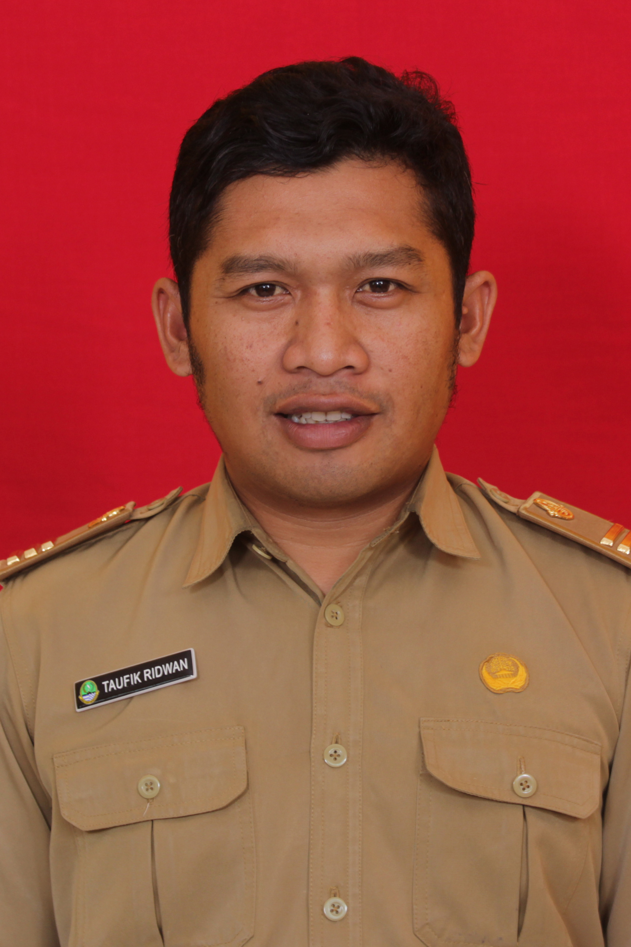 Taufik Ridwan, S.Pd